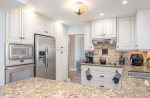 Stainless Steel Appliances and Kitchen with Granite Counters